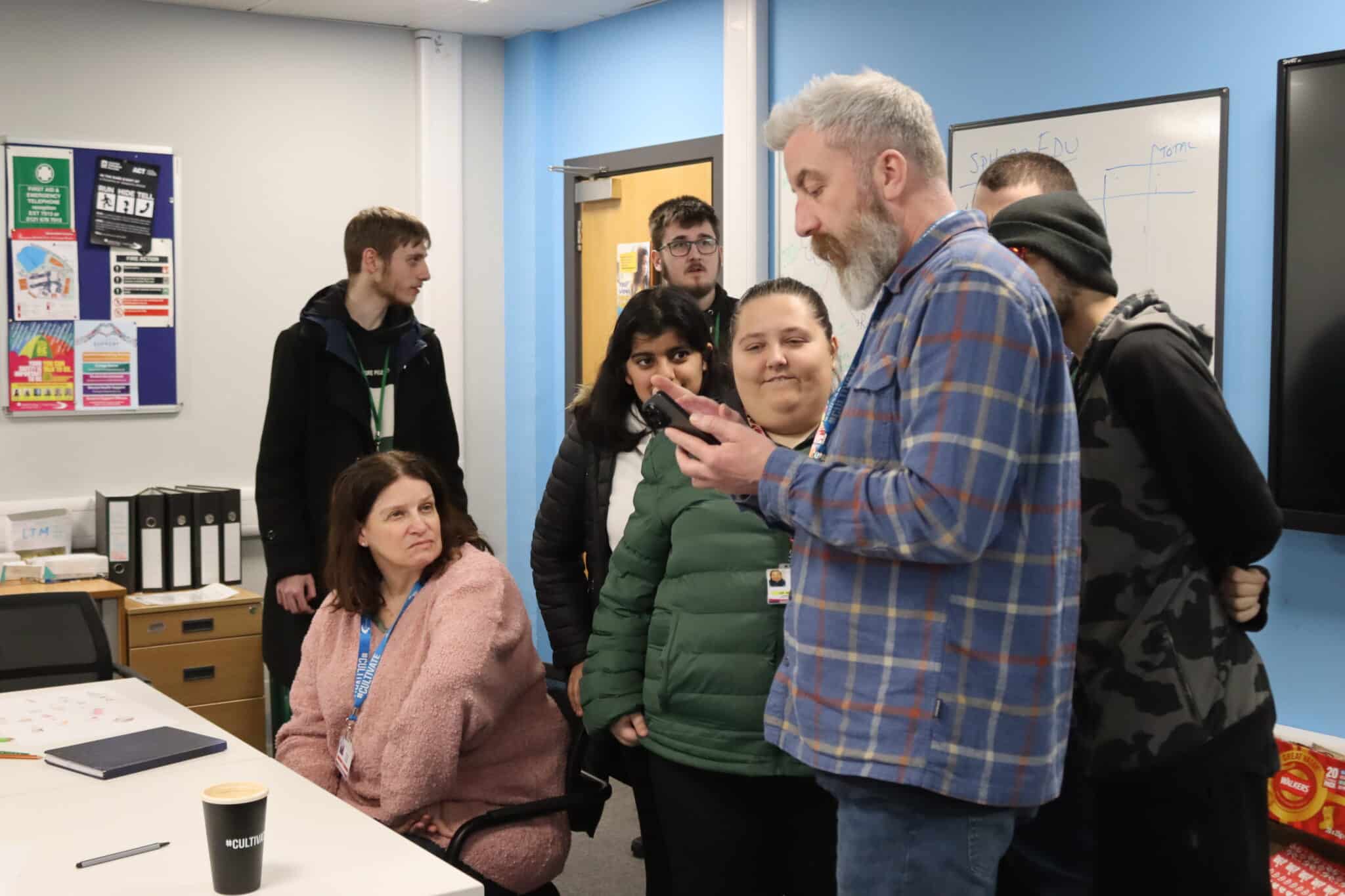 The lecturer chatting to students with the sphero bolts